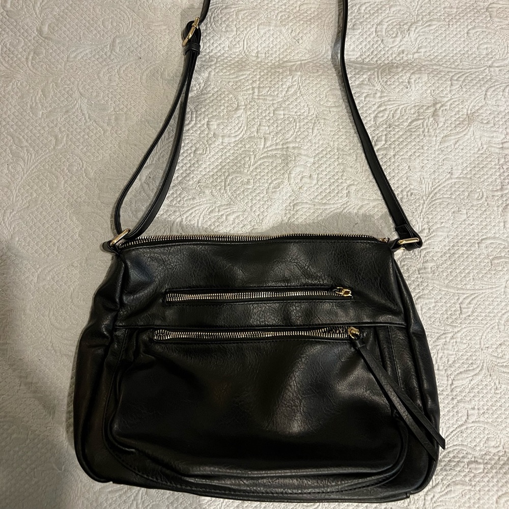 Black crossbody adjustable strap gently used